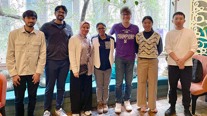 Dmello Lab team members posing and smiling