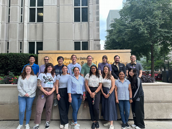 Lab team members gather for a group photo