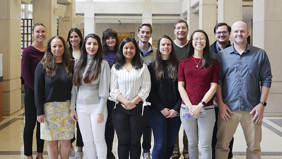 Lab team members gather for a group photo