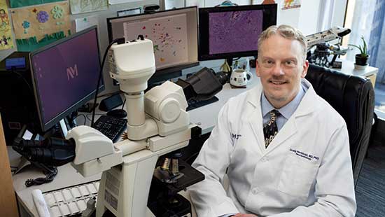 Dr. Horbinski at his desk