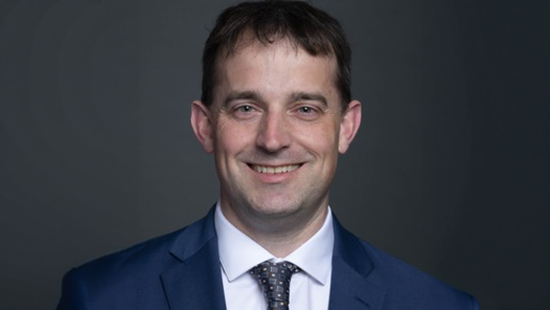 Headshot of Mark Youngblood, MD, PhD
